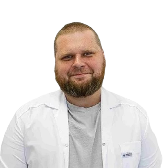 Главный врач Бунин Андрей Михайлович улыбается смотря в камеру